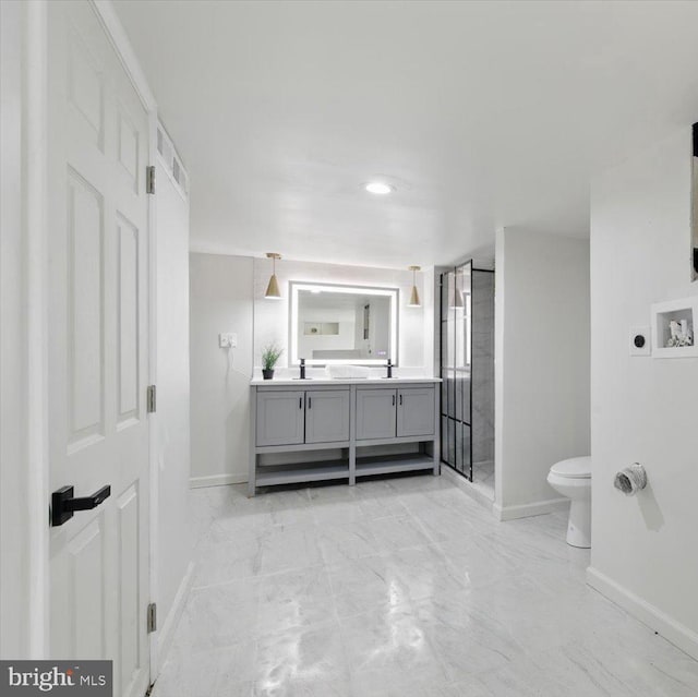 408 Fairview Ave, Lancaster, PA 17603 - bathroom with toilet, baseboards, marble finish floor, and a stall shower