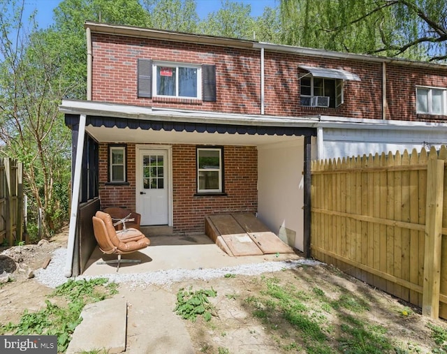 408 Fairview Ave, Lancaster, PA 17603 - back of property with brick siding and fence