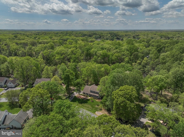 aerial view featuring a view of trees