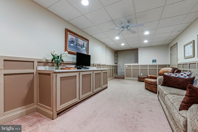 living area featuring light colored carpet, recessed lighting, a paneled ceiling, and ceiling fan