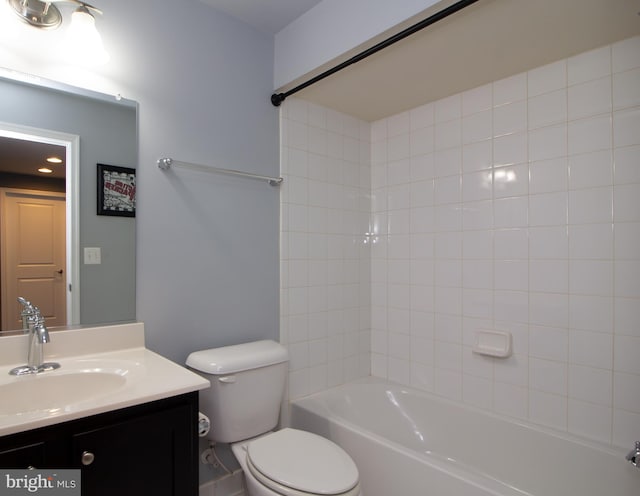 full bath with vanity, washtub / shower combination, and toilet
