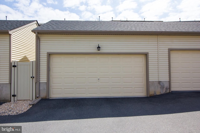 garage featuring a gate