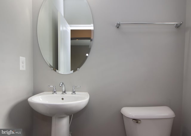 bathroom featuring toilet