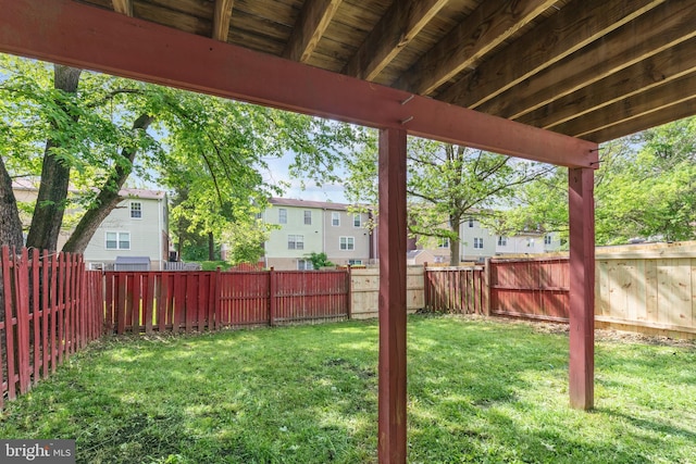 view of yard featuring a residential view