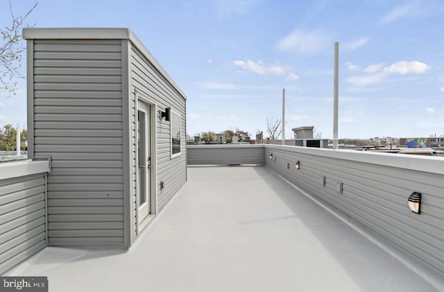 view of patio with a balcony