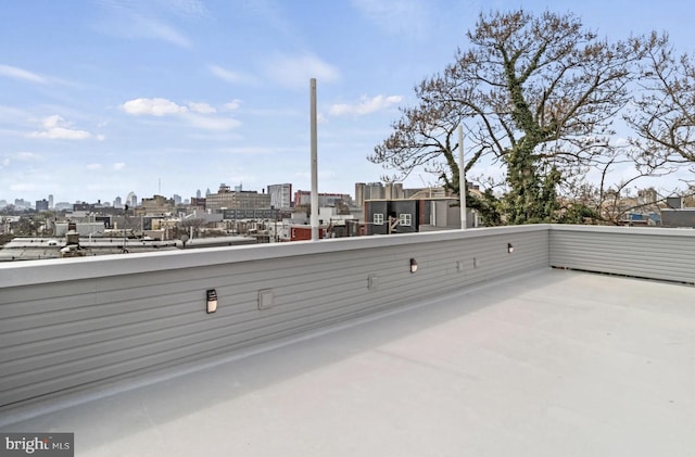view of patio / terrace featuring a city view