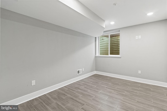 2114 N 8th St, Philadelphia, PA 19122 - spare room with wood finished floors and recessed lighting