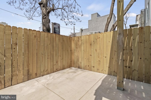 view of patio with fence