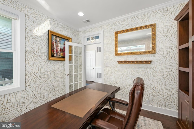office space featuring visible vents, ornamental molding, dark wood-style floors, wallpapered walls, and french doors