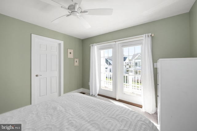 bedroom featuring baseboards, carpet flooring, ceiling fan, and access to exterior