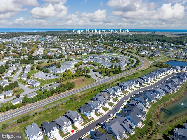 aerial view with a residential view and a water view