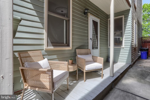 wooden deck featuring covered porch