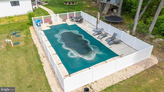 32991 Daisey Rd, Frankford, DE 19945 - view of pool featuring outdoor dining area, a lawn, a patio area, a fenced in pool, and a fenced backyard