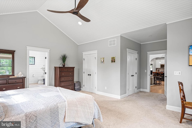 32991 Daisey Rd, Frankford, DE 19945 - bedroom featuring light colored carpet, visible vents, arched walkways, vaulted ceiling, and baseboards