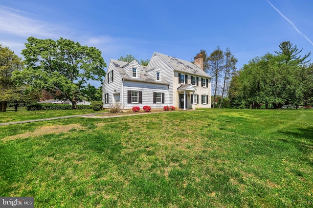 2430 Stanwick Rd, Phoenix, MD 21131 - colonial home with a chimney and a front lawn