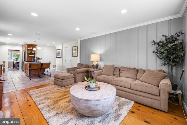 2430 Stanwick Rd, Phoenix, MD 21131 - living area featuring recessed lighting, light wood finished floors, and crown molding