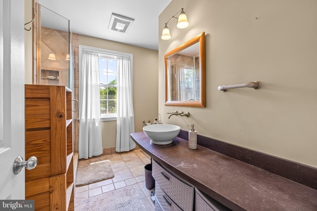 2430 Stanwick Rd, Phoenix, MD 21131 - full bath featuring vanity, tile patterned flooring, walk in shower, and visible vents