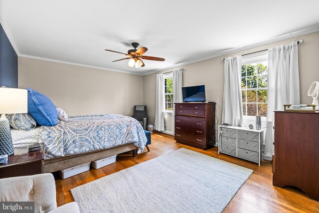 2430 Stanwick Rd, Phoenix, MD 21131 - bedroom featuring crown molding, ceiling fan, and wood finished floors