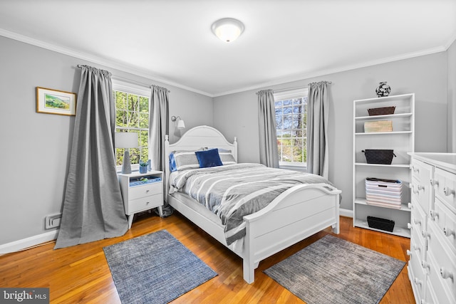 2430 Stanwick Rd, Phoenix, MD 21131 - bedroom with crown molding, light wood-style floors, and baseboards