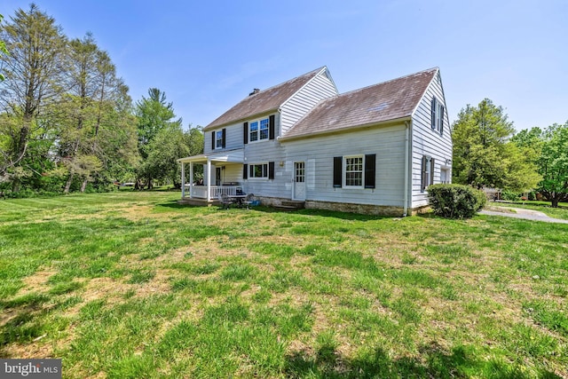 2430 Stanwick Rd, Phoenix, MD 21131 - back of house with a lawn and a porch