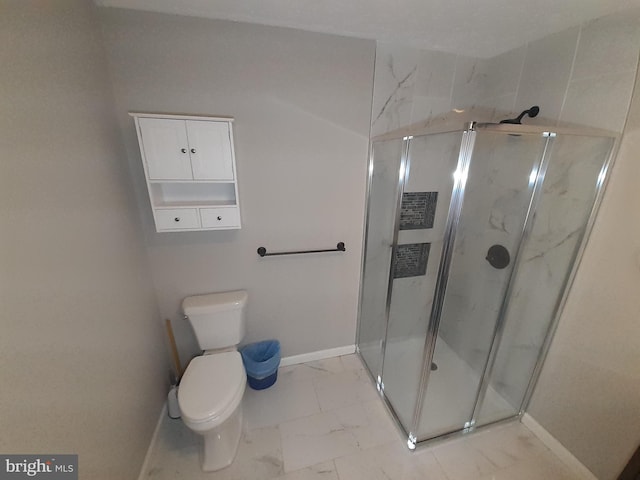 bathroom with baseboards, toilet, a marble finish shower, and marble finish floor