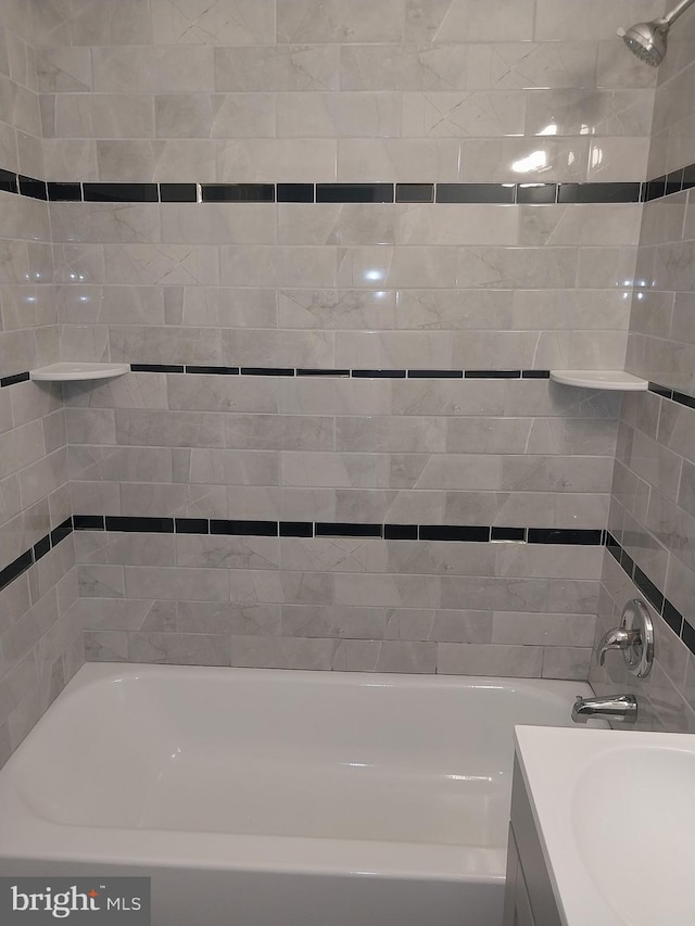 bathroom featuring vanity and shower / washtub combination