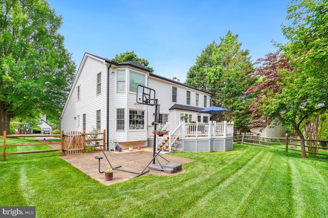 20662 Ashleaf Ct, Sterling, VA 20165 - rear view of house with a deck, a patio, and a gate