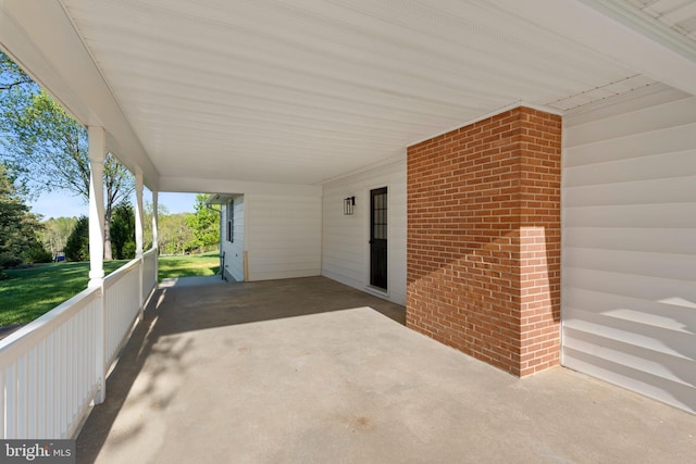 view of patio / terrace featuring a carport