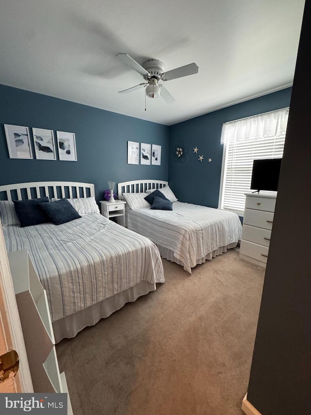bedroom with carpet and ceiling fan