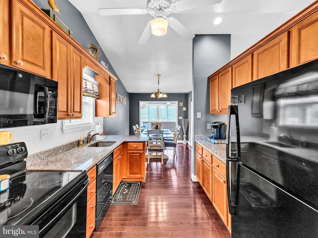10350 Keyser Point Rd, Ocean City, MD 21842 - kitchen featuring black appliances, vaulted ceiling, dark wood-style floors, ceiling fan, and decorative backsplash