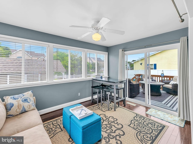 10350 Keyser Point Rd, Ocean City, MD 21842 - living room featuring wood finished floors, a ceiling fan, and baseboards
