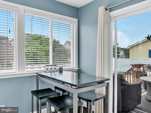 10350 Keyser Point Rd, Ocean City, MD 21842 - dining room featuring plenty of natural light and baseboards