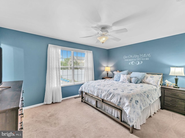 10350 Keyser Point Rd, Ocean City, MD 21842 - carpeted bedroom featuring baseboards and a ceiling fan