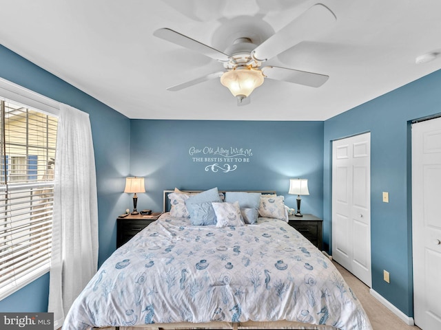 10350 Keyser Point Rd, Ocean City, MD 21842 - bedroom with light carpet, baseboards, and ceiling fan