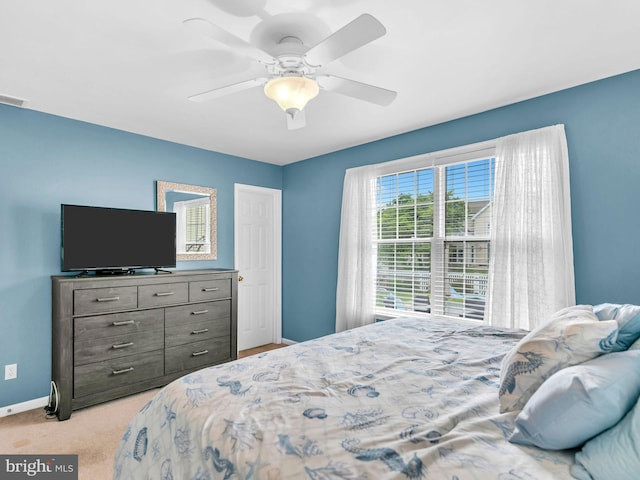 10350 Keyser Point Rd, Ocean City, MD 21842 - carpeted bedroom featuring baseboards and a ceiling fan