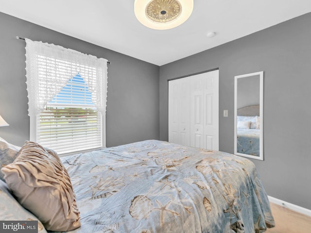 10350 Keyser Point Rd, Ocean City, MD 21842 - bedroom with baseboards, a closet, and carpet floors