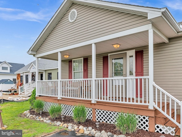 10350 Keyser Point Rd, Ocean City, MD 21842 - view of front of house featuring covered porch