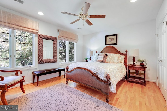 bedroom with baseboards, a ceiling fan, recessed lighting, and wood finished floors