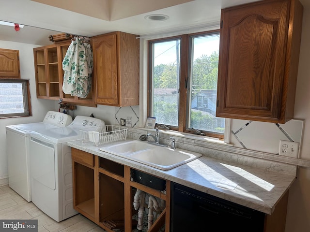 laundry room featuring washer and dryer and cabinet space
