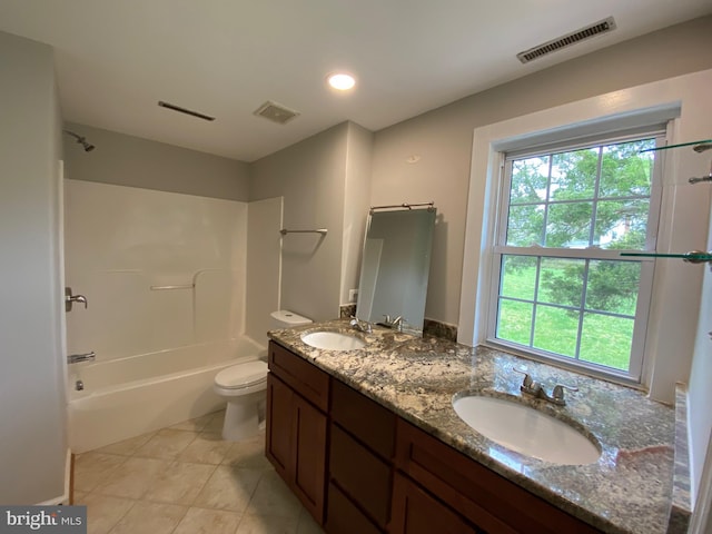 full bath with a sink, a wealth of natural light, and visible vents