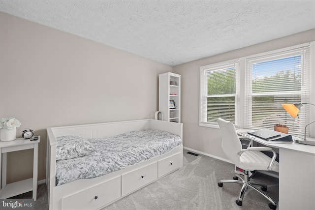 8140 Willowdale Ct, Springfield, VA 22153 - bedroom with light carpet, baseboards, an office area, and a textured ceiling
