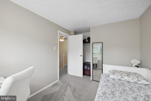 8140 Willowdale Ct, Springfield, VA 22153 - carpeted bedroom featuring a textured ceiling and baseboards