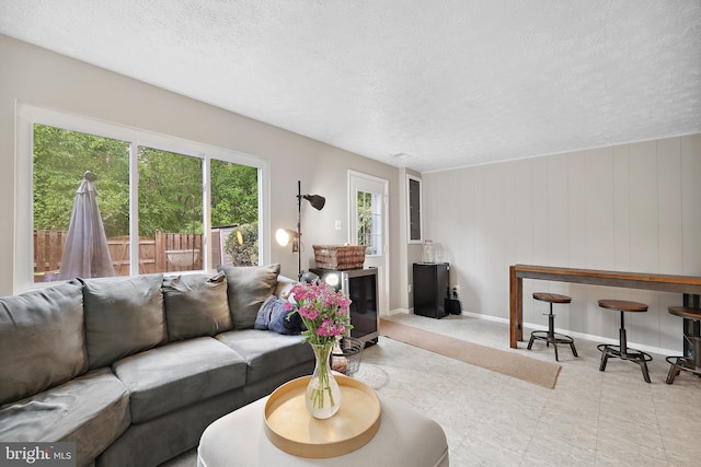 8140 Willowdale Ct, Springfield, VA 22153 - living room featuring a textured ceiling and baseboards