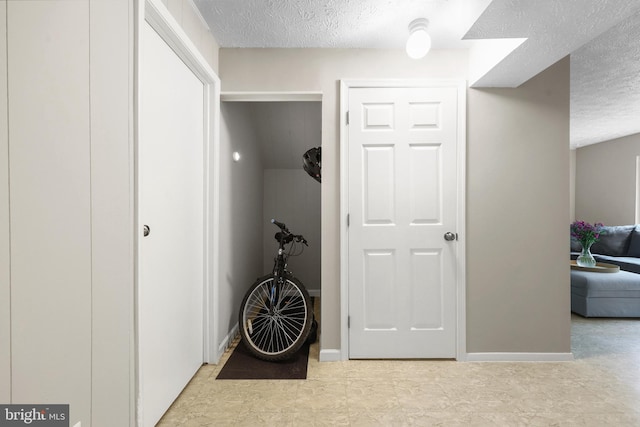 8140 Willowdale Ct, Springfield, VA 22153 - hall featuring a textured ceiling and baseboards
