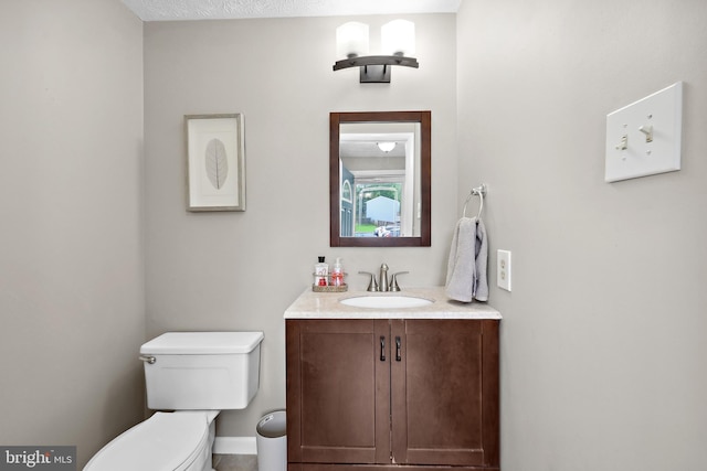 8140 Willowdale Ct, Springfield, VA 22153 - half bath with toilet, vanity, and baseboards