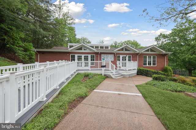 8140 Willowdale Ct, Springfield, VA 22153 - view of front of property with brick siding, fence, and french doors
