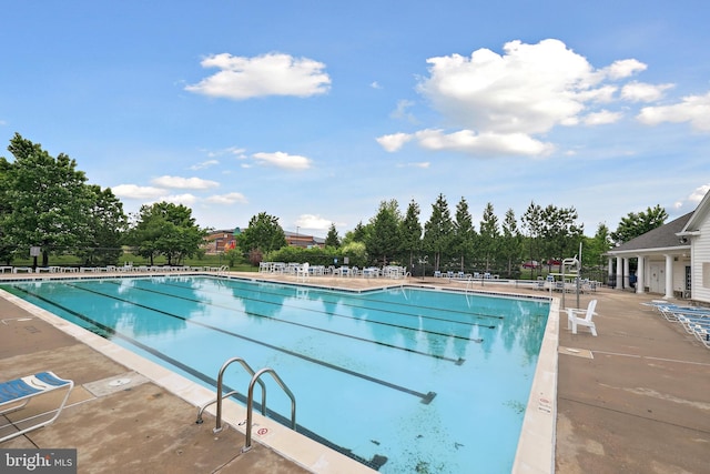 8140 Willowdale Ct, Springfield, VA 22153 - community pool featuring a patio