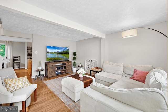 8140 Willowdale Ct, Springfield, VA 22153 - living area with a textured ceiling and light wood finished floors
