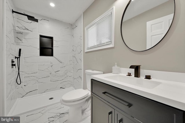 bathroom featuring vanity, marble finish floor, a shower, toilet, and recessed lighting
