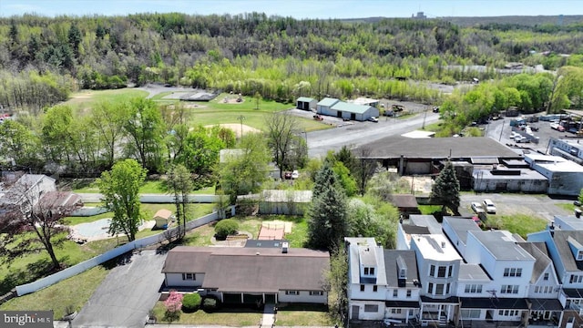 drone / aerial view with a forest view
